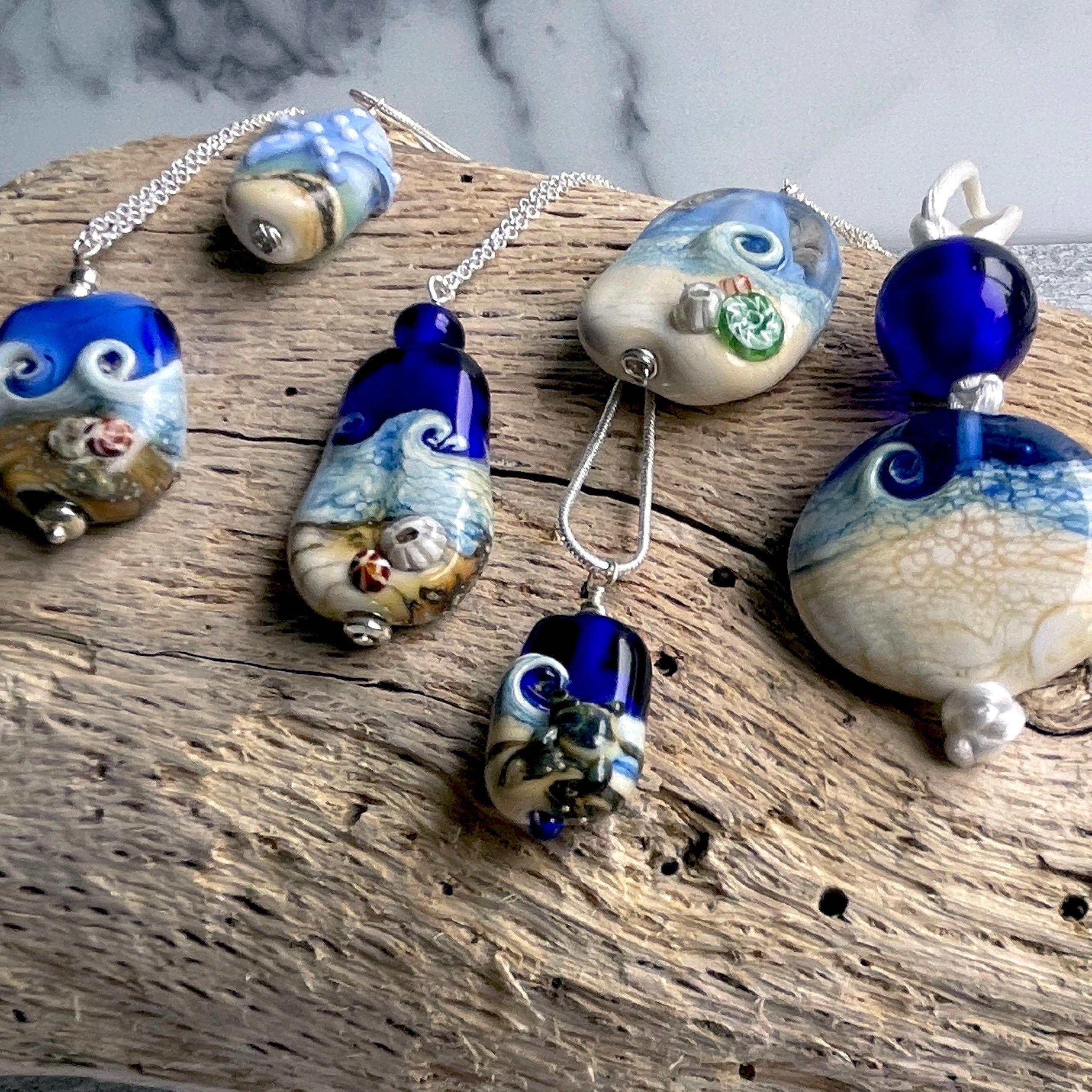 Ocean Necklaces on Driftwood